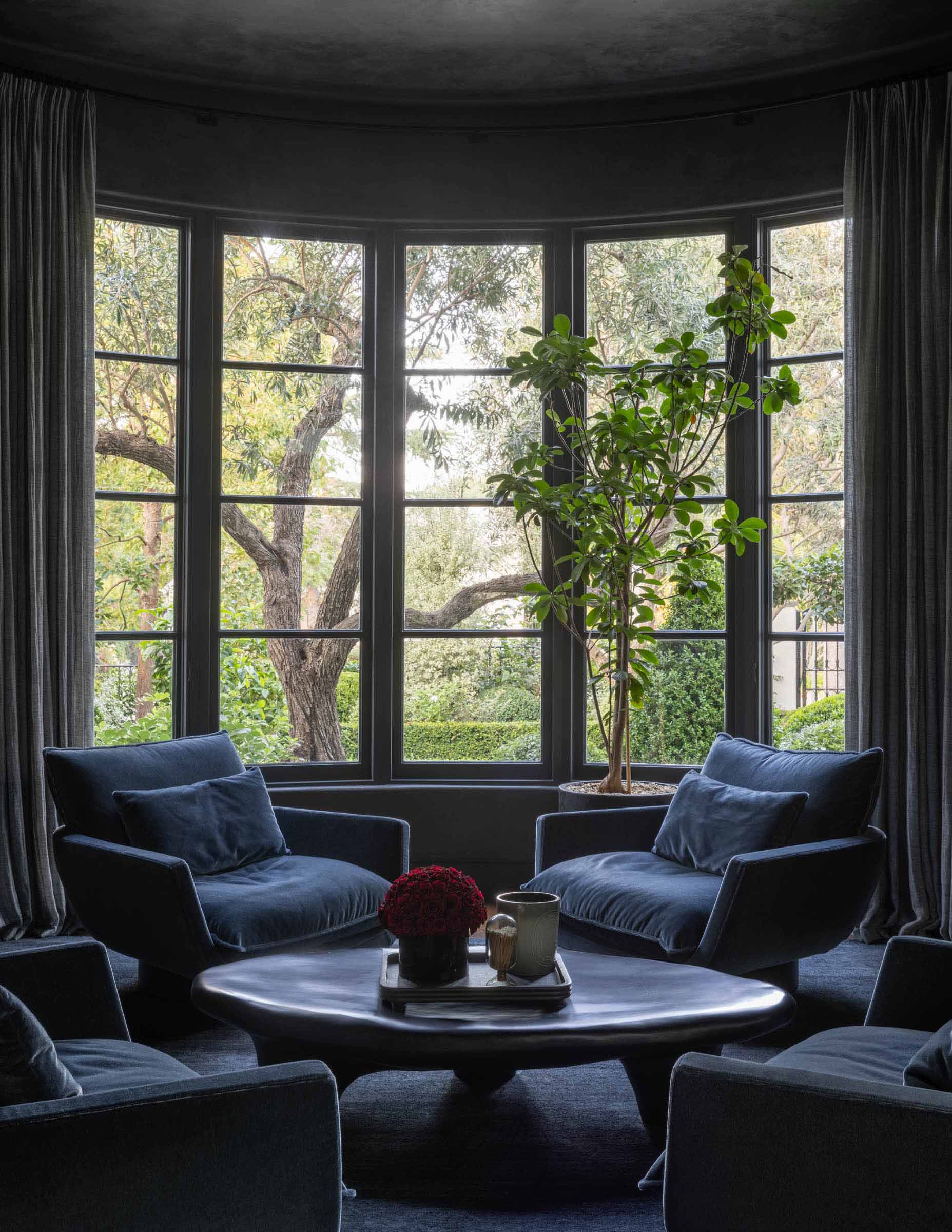 Green outdoor views out window in sitting room | Jack Haley Exterior | Eco-Luxury Landscape Architecture + Design